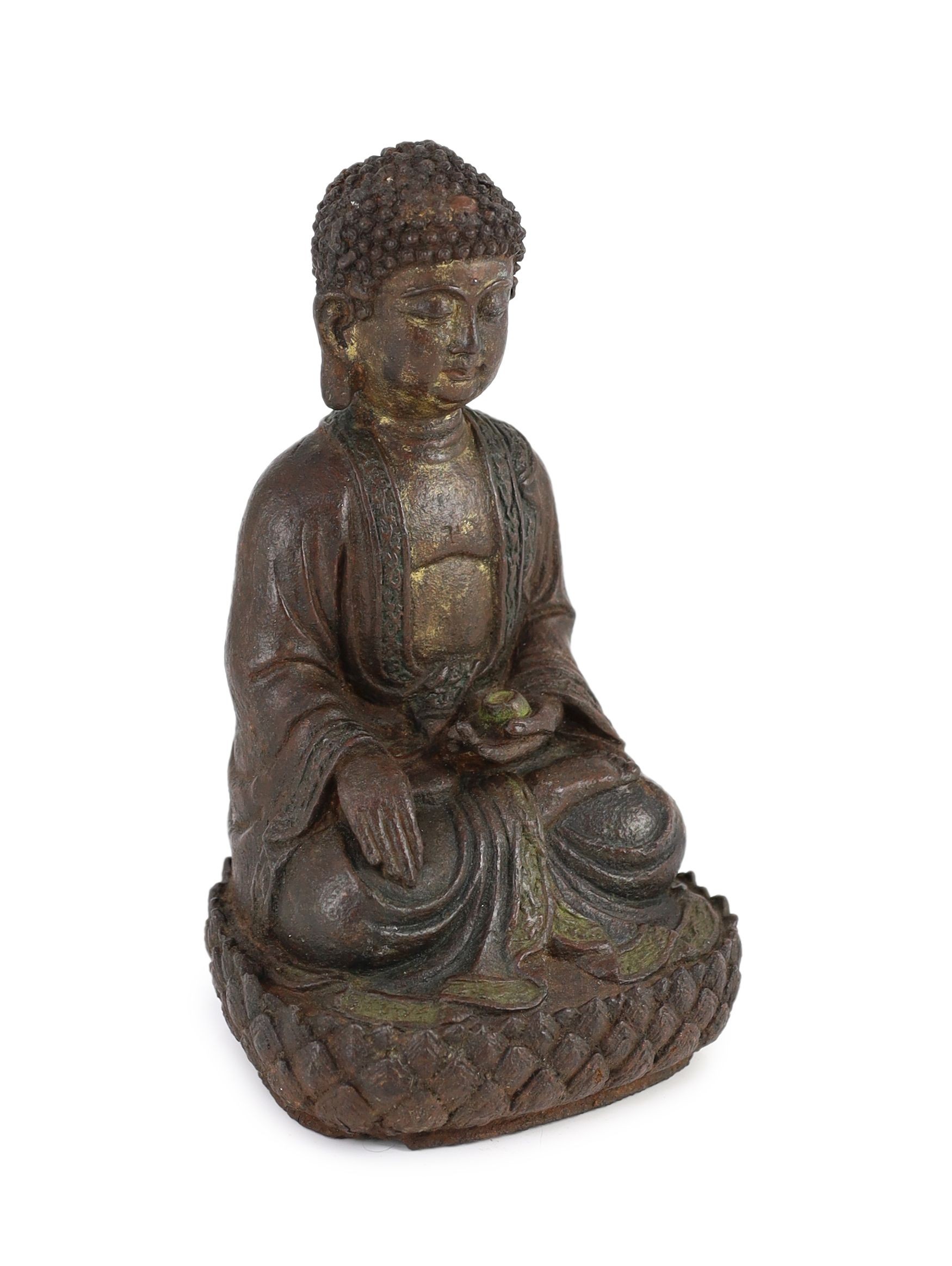A Chinese Ming cast iron figure of Buddha Shakyamuni, 15th/16th century, 24.5cm high